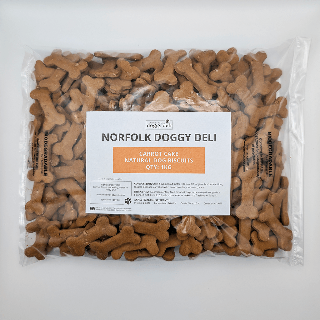 Package of Norfolk Doggy Deli carrot cake dog biscuits on a white background