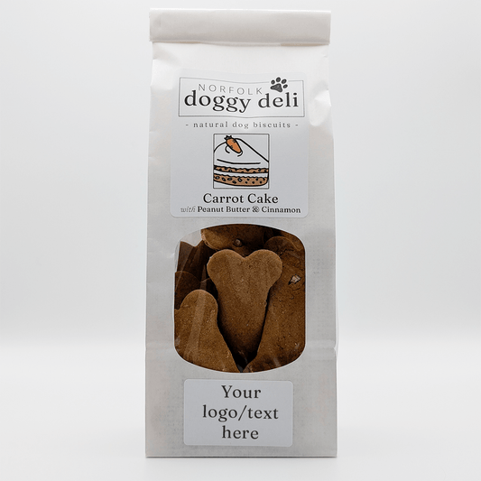 Package of Norfolk Doggy Deli Carrot Cake dog biscuits on a white background