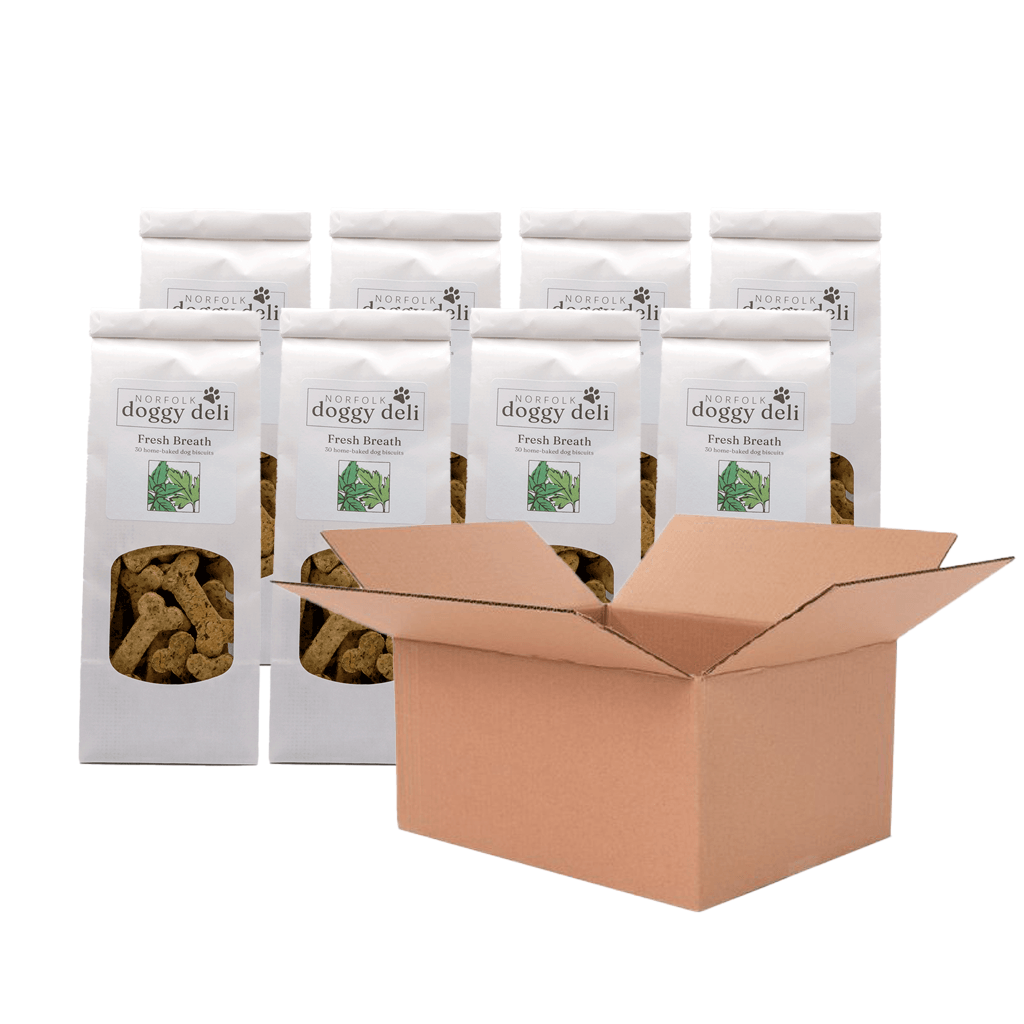 Multiple packages of 'doggy deli' pet treats with an open cardboard box on a white background