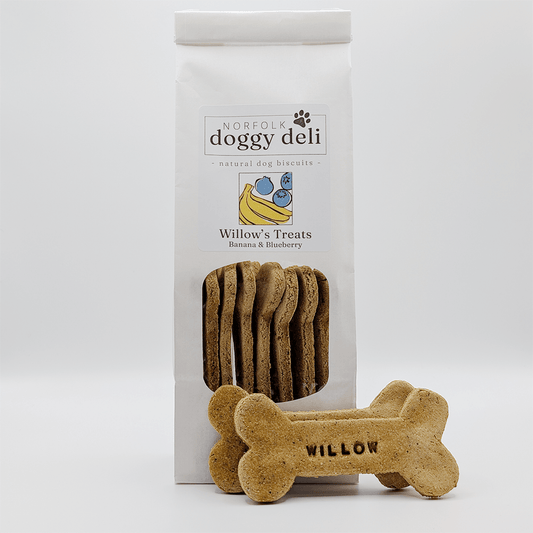 Dog biscuit packaging with a bone-shaped treat labeled 'Willow' from Norfolk Doggy Deli.
