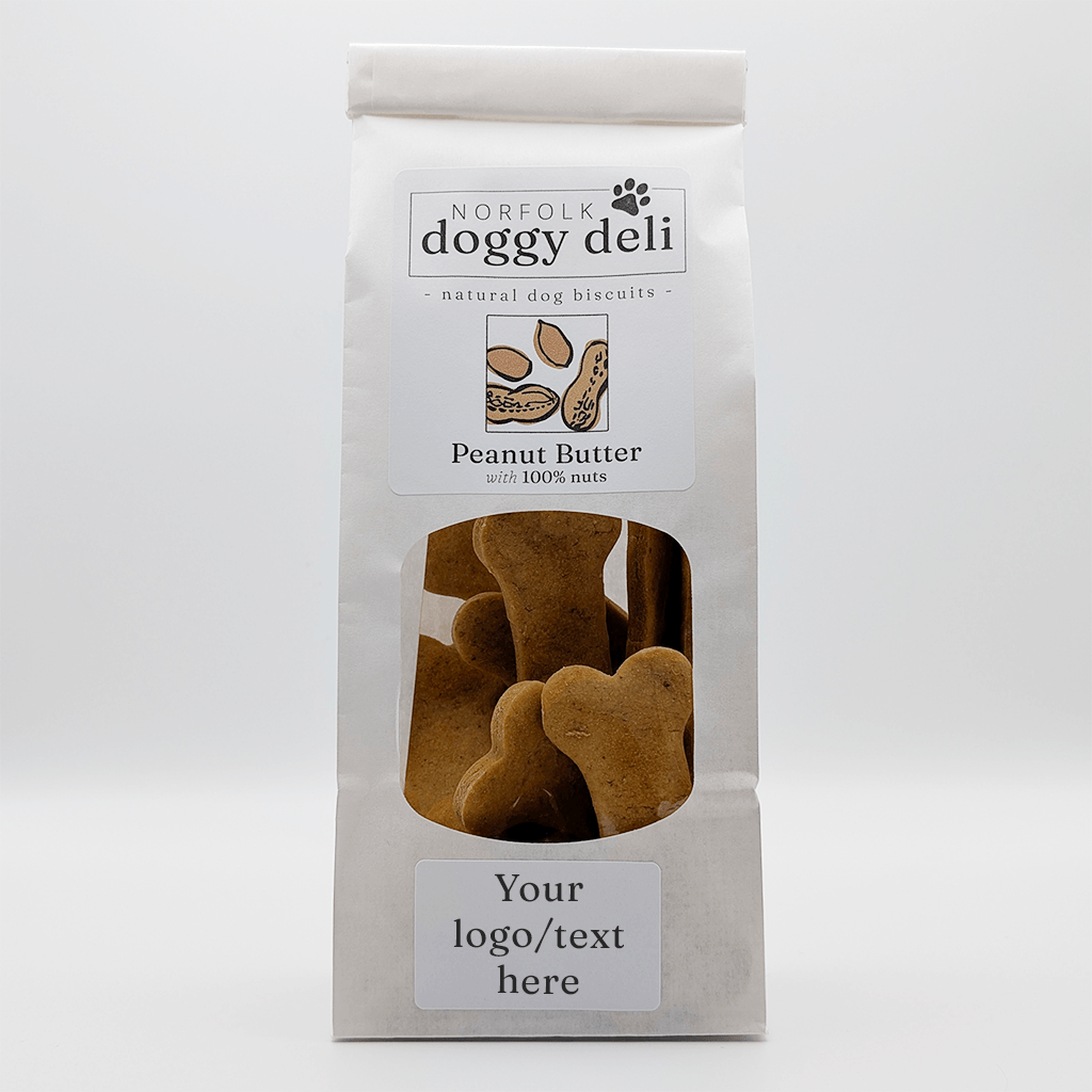 Package of Norfolk Doggy Deli peanut butter dog biscuits on a white background