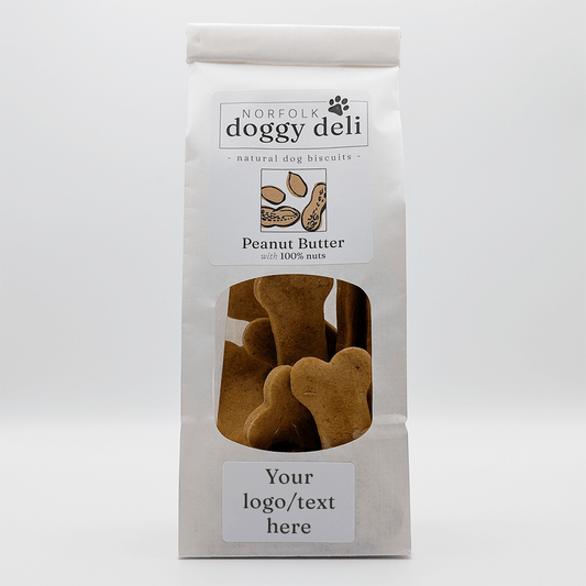 Package of Norfolk Doggy Deli peanut butter dog biscuits on a white background