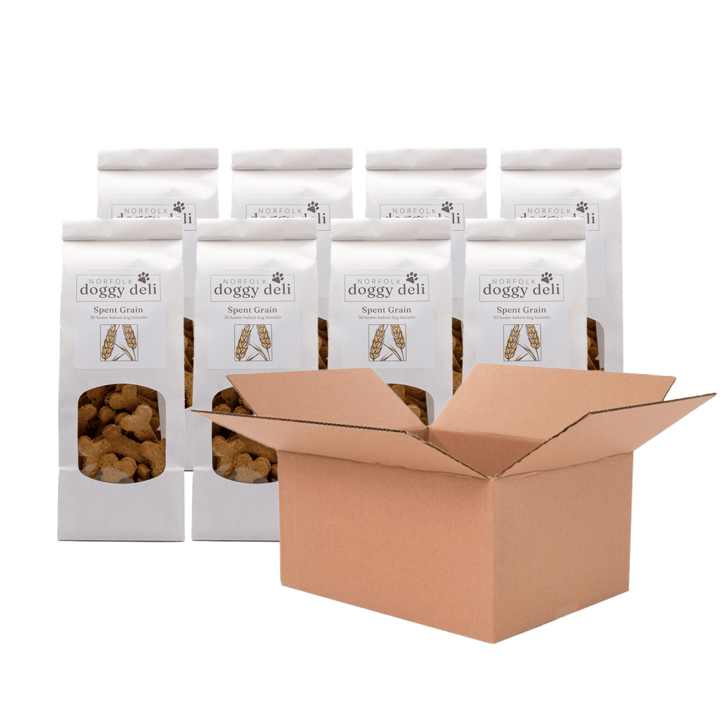 Multiple packages of 'doggy deli' pet food with an open cardboard box on a white background